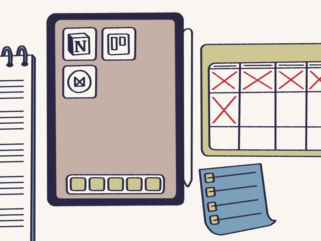 A phone, notebook, and various tools for digital organization, ideal for creative professionals
