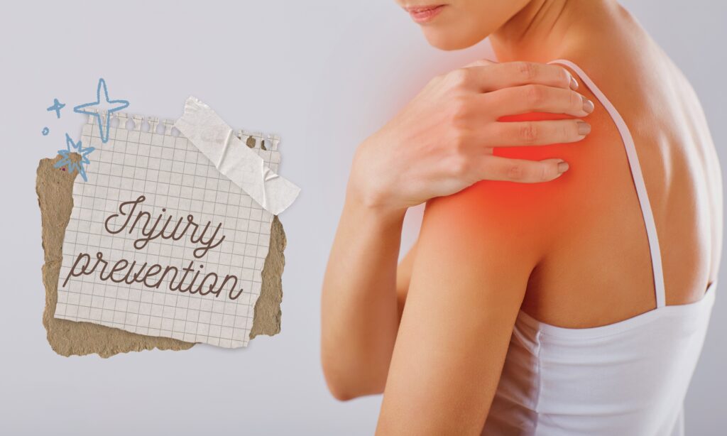 A woman displays a paper with "Injury Prevention" written on it, highlighting the topic of preventing injuries.
